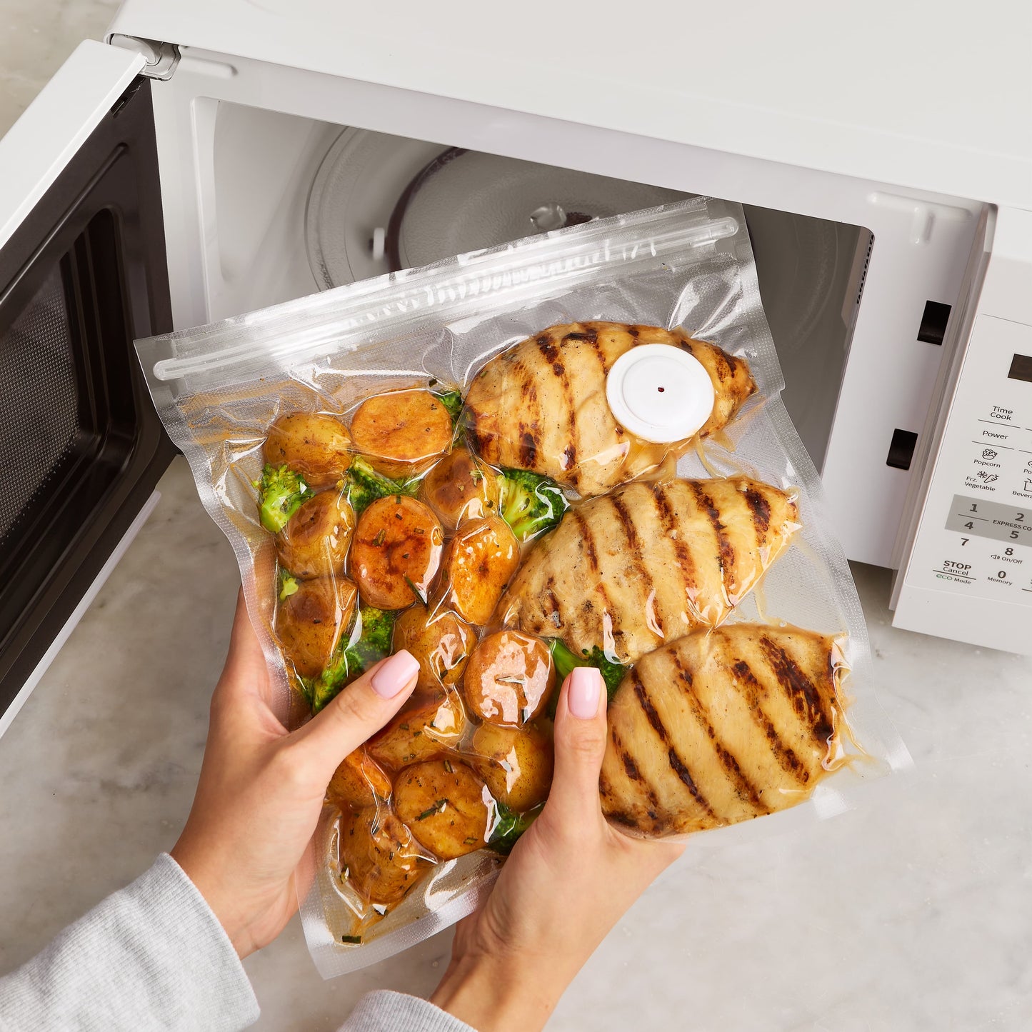 Vaculuxe™ Vacuum Sealing System
